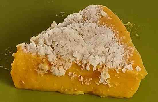 A piece of ataulfo mango yogurt cake